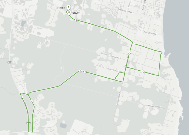 A map of Narragansset, RI with a course highlighted. START as South Pier Rd (near house number 225) and proceed SE toward Ocean Rd Turn RIGHT onto Ocean Rd Turn RIGHT onto Earles Ct MILE 1 is on Earles Ct near corner of Ocean Rd - 8 feet, 6 inches after yellow fire hydrant at corner of Earles Ct and Ocean Rd Turn LEFT onto Gibson Ave Turn RIGHT onto Kinney Ave MILE 2 is on Kinney Ave - 44 feet 0 inches after hiker crossing image sign on left side of road Turn LEFT onto Old Point Judith Rd Turn RIGHT onto Windermere Rd Turn RIGHT onto Point Judith Rd (RI-108) Turn RIGHT onto Kinney Ave MILE 3 is on Kinney Ave near corner of Point Judith Rd - 21 feet, 5 inches after end of paved sidewalk on right side of road Bear LEFT to stay on Kinney Ave 5K split is on Kinney Ave - 69 feet, 4 inches after left curve image sign on left side of road Turn LEFT back onto Gibson Ave. Mile 4 is on Gibson Ave - 6 feet, 3 inches before mailbox pole for #81 Gibson Ave Turn LEFT back onto S. Pier Rd Mile 4.75 (1/4 mile to go) is on S. Pier Rd – in middle of driveway to #207 S. Pier Rd and 34 feet, 3 inches after fire hydrant in front of yard of #207 S. Pier Rd Turn RIGHT into Narragansett Middle School parking drive. Certified 8km point is in Narragansett Middle School drive Continue to FINISH at Narragansett Pier Middle School